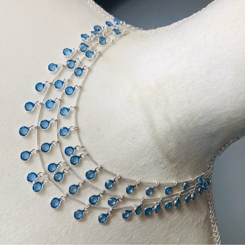 Vintage Anne Klein lion triple strand framed blue crystal dangle necklace